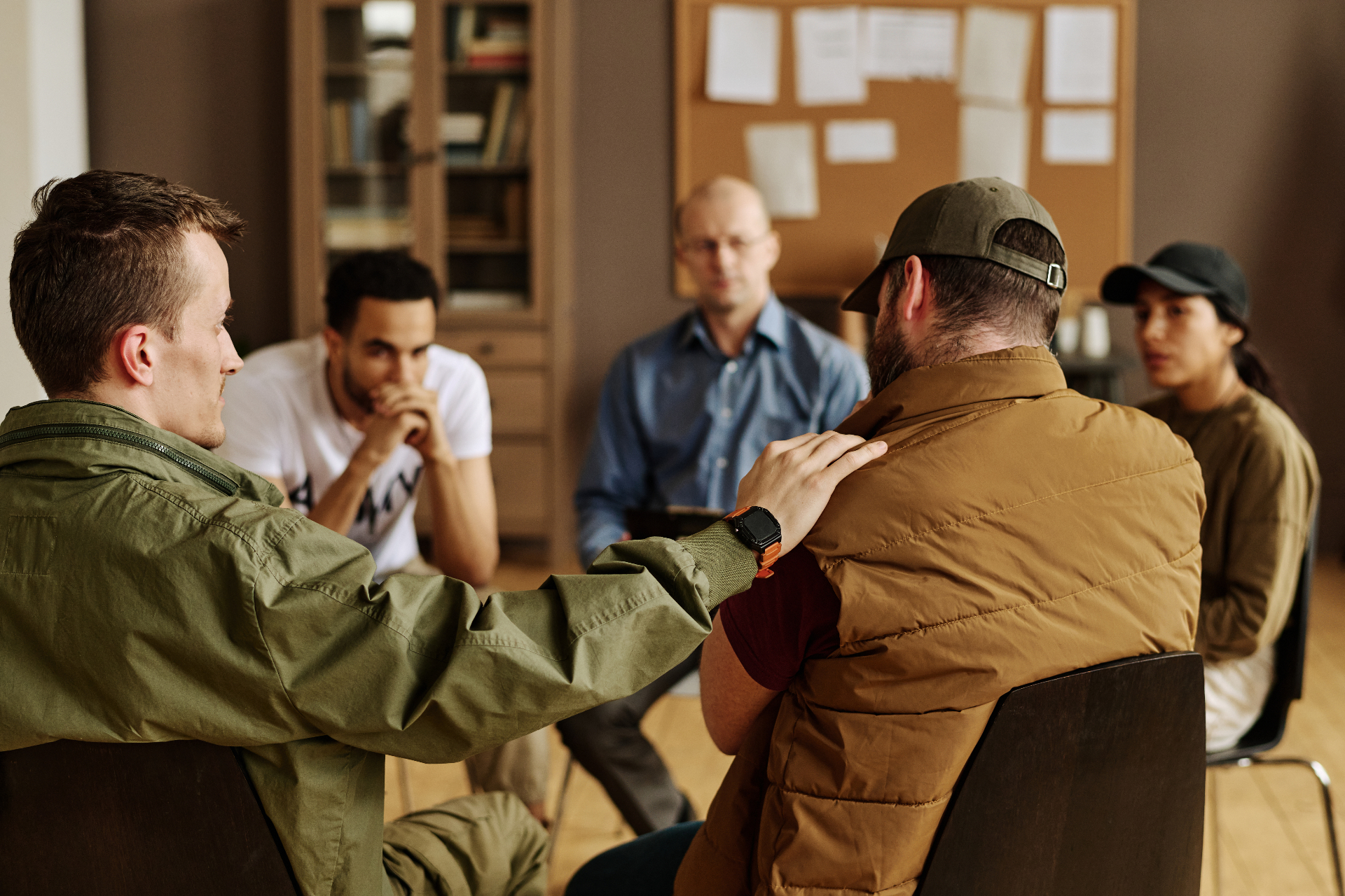 Men in serious conversation together.